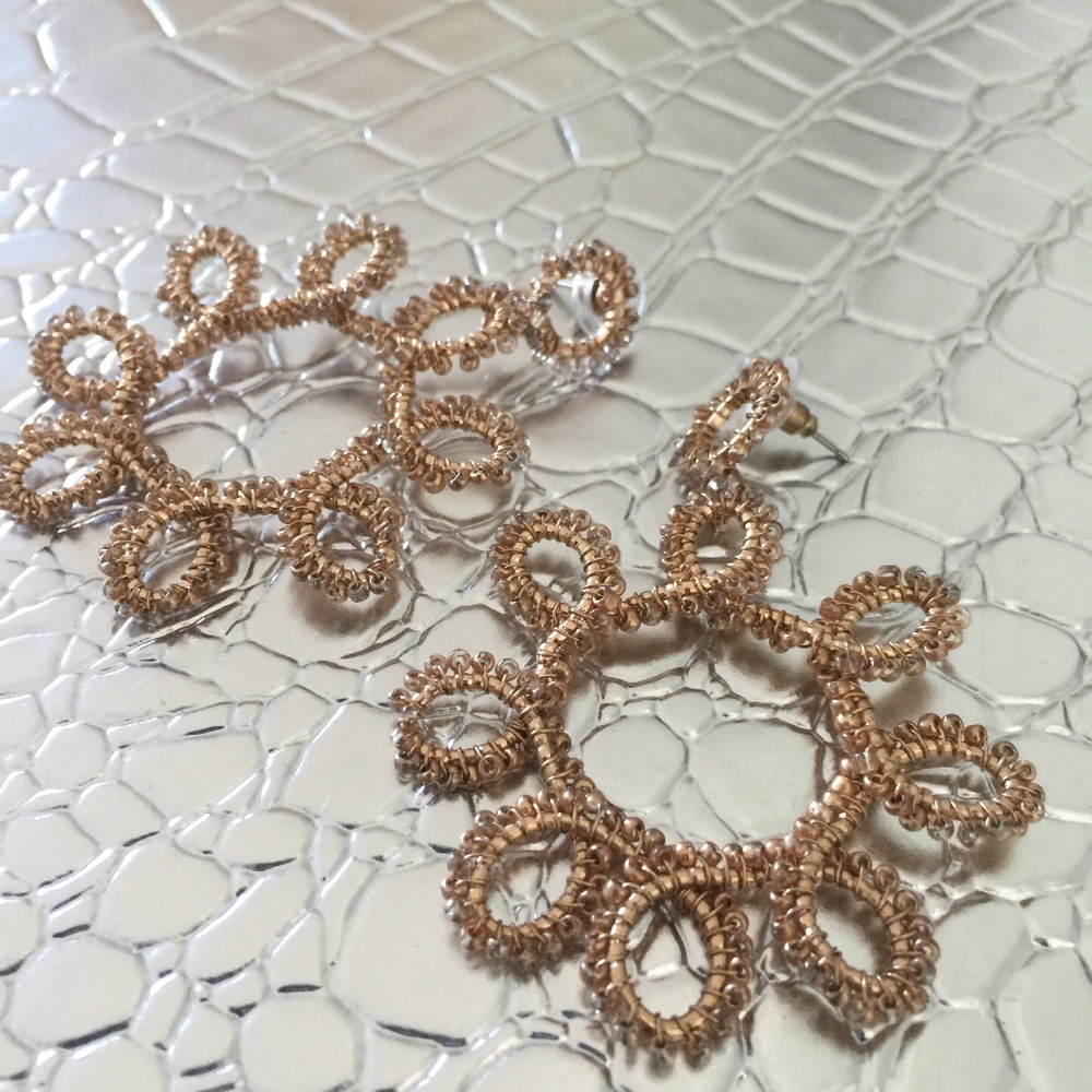 GOLD LARGE HOOP DESIGN COSTUME EARRING REALLY GOES WELL WITH ANYTHING.